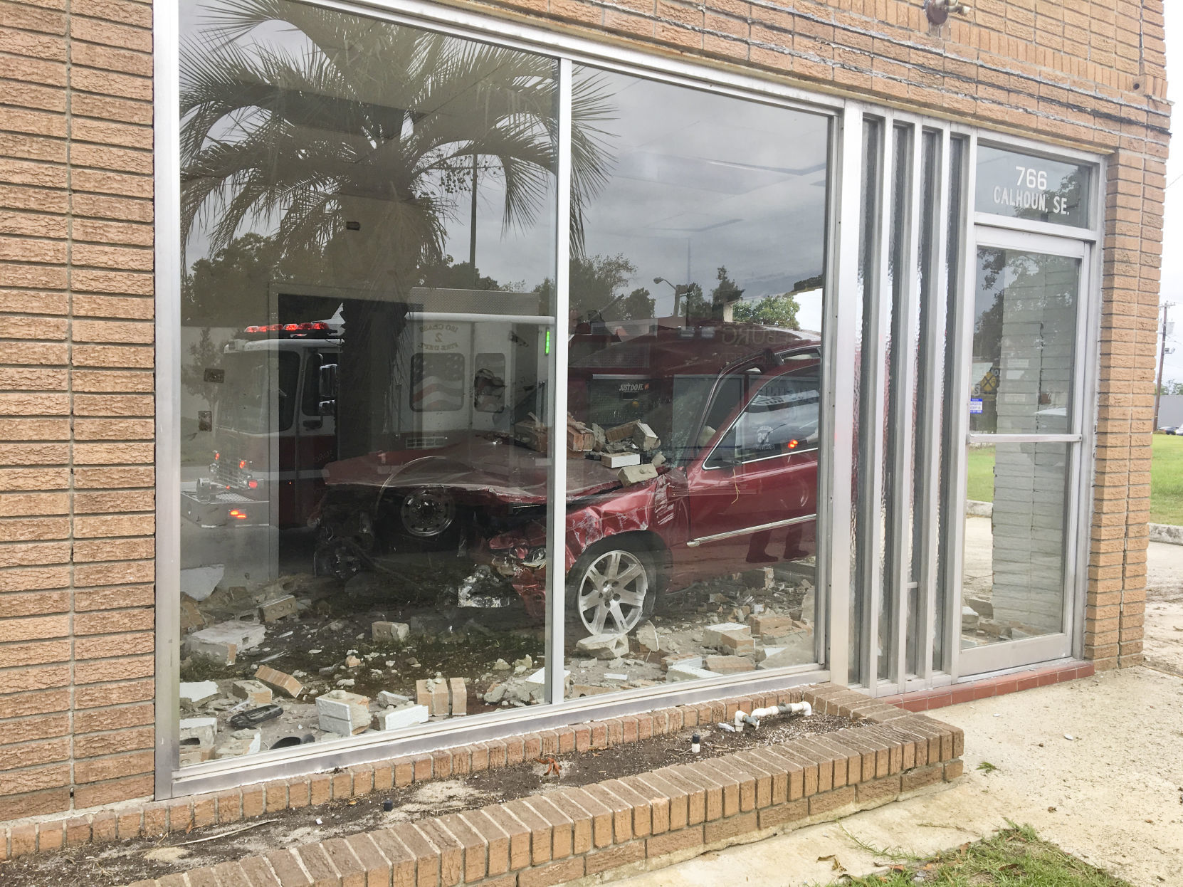 Car Crashes into Building